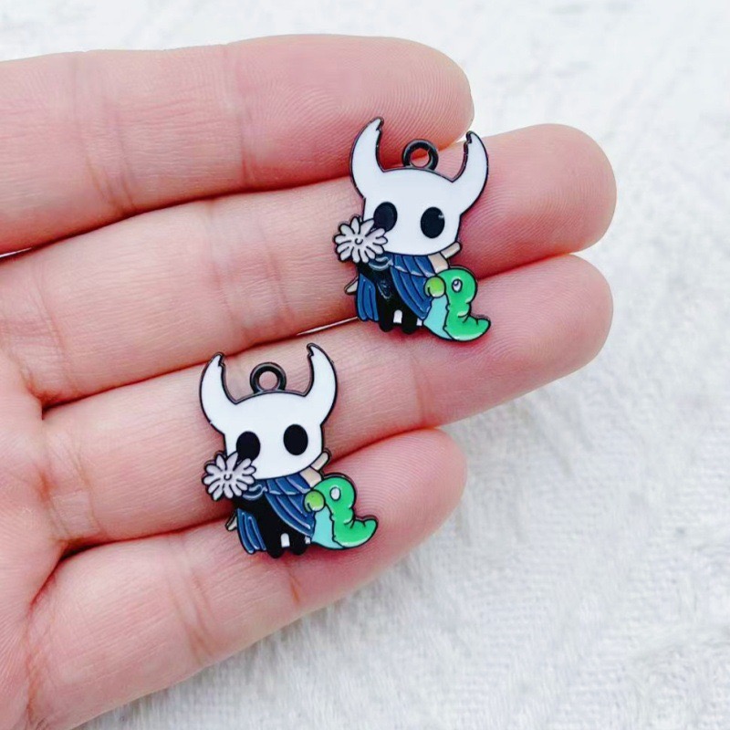 10pcs alloy drip oil cartoon a - Party Games Crazy 评论和价格